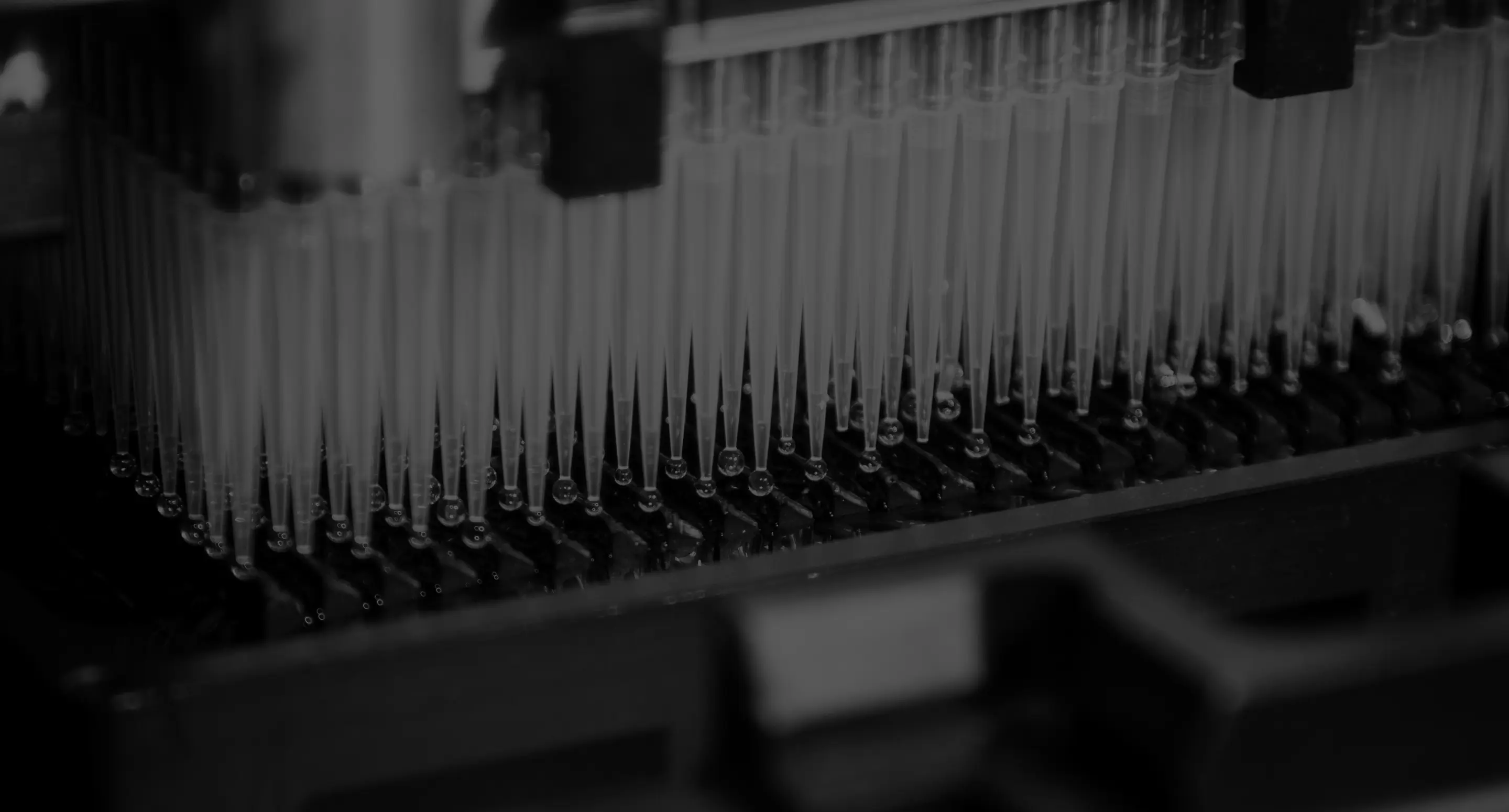 Laboratory image showing automated pipettes.